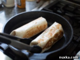 Grilled Chipotle Ranch Chicken Burrito on a skillet