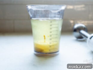 layer ingredients into an immersion blender cup to make mayo