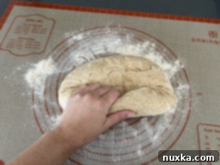forming sandwich loaf by hand from whole wheat dough