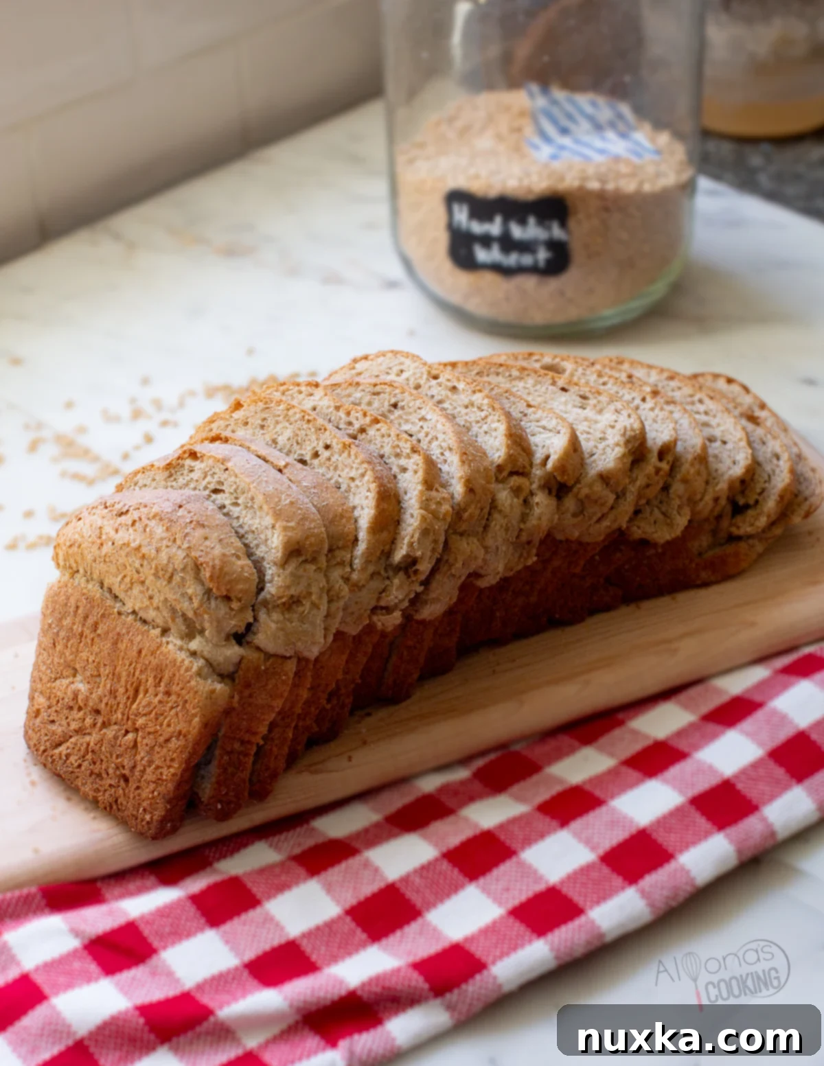 sliced homemade whole wheat sandwich bread, showcasing soft texture