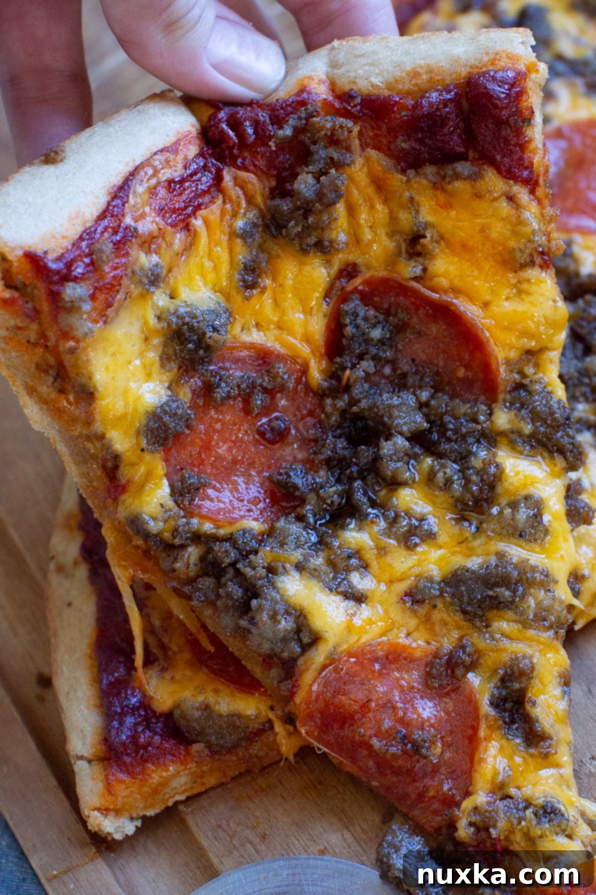 whole wheat pizza dough with freshly milled flour, golden and bubbly