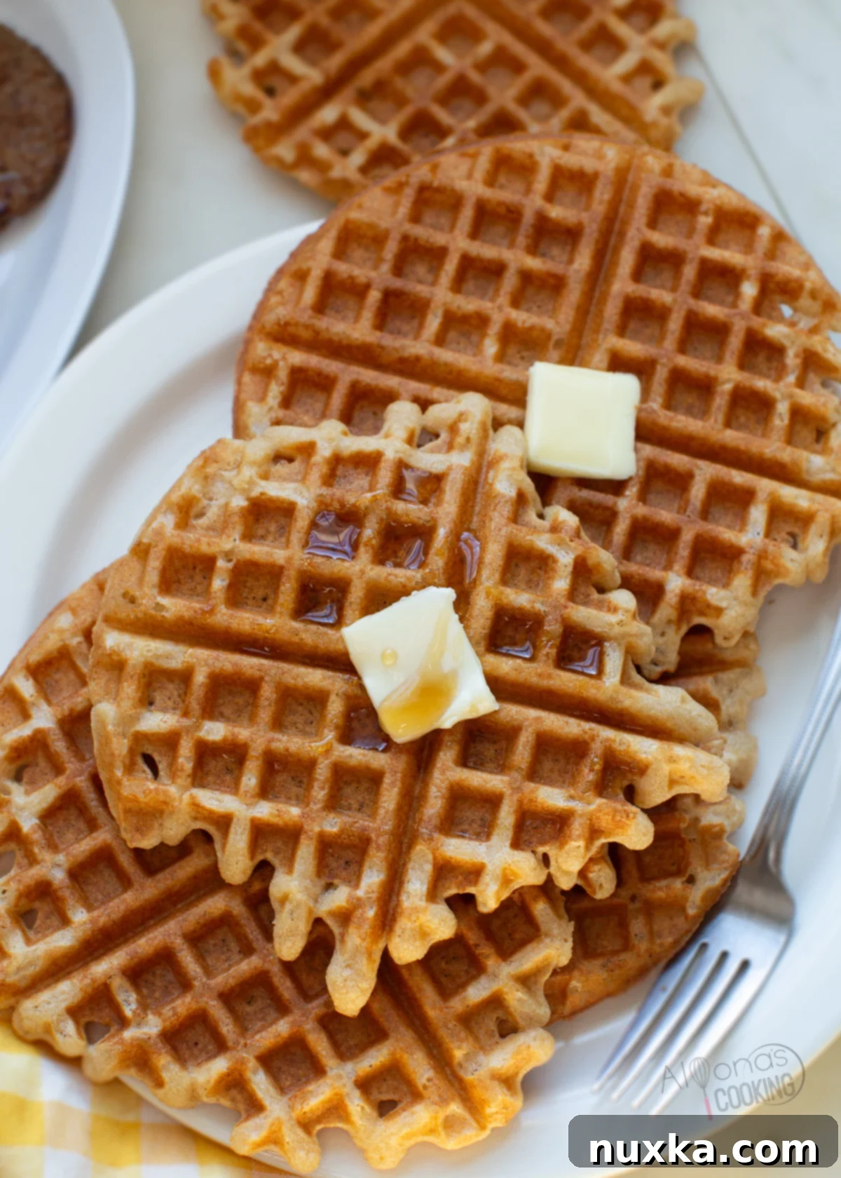 Delicious whole wheat waffles with freshly milled flour, golden brown and perfectly crispy.