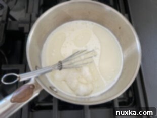Heating coconut oil and milk for waffle batter