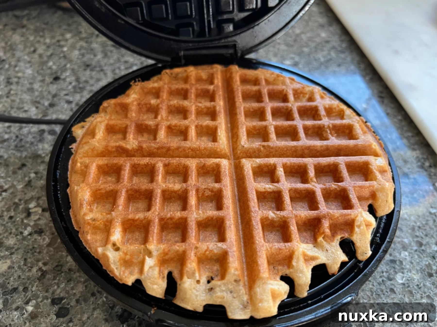 Close-up of crispy whole wheat waffles, golden and inviting.