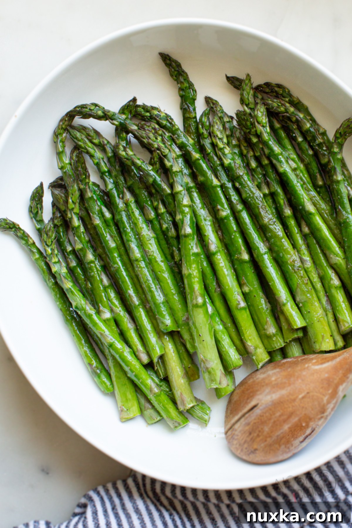 Oven Roasted Asparagus Recipe, perfectly cooked with garlic and oil