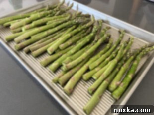 preparing asparagus for roasting