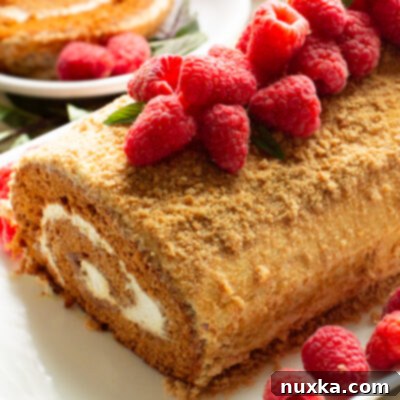 honey cake roll with raspberries
