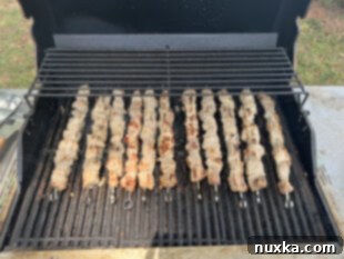 Grilled shashlik cooking over an open flame