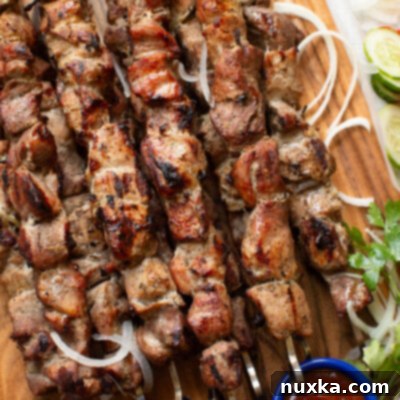 Grilled Pork Shashlik on a skewer, ready to eat