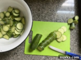 sliced cucumbers for cucumber onion salad