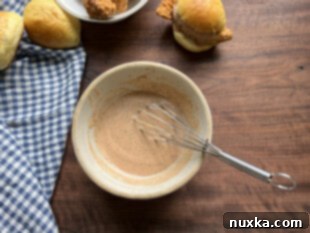 homemade Zax sauce whisked together in a bowl, smooth and ready to chill