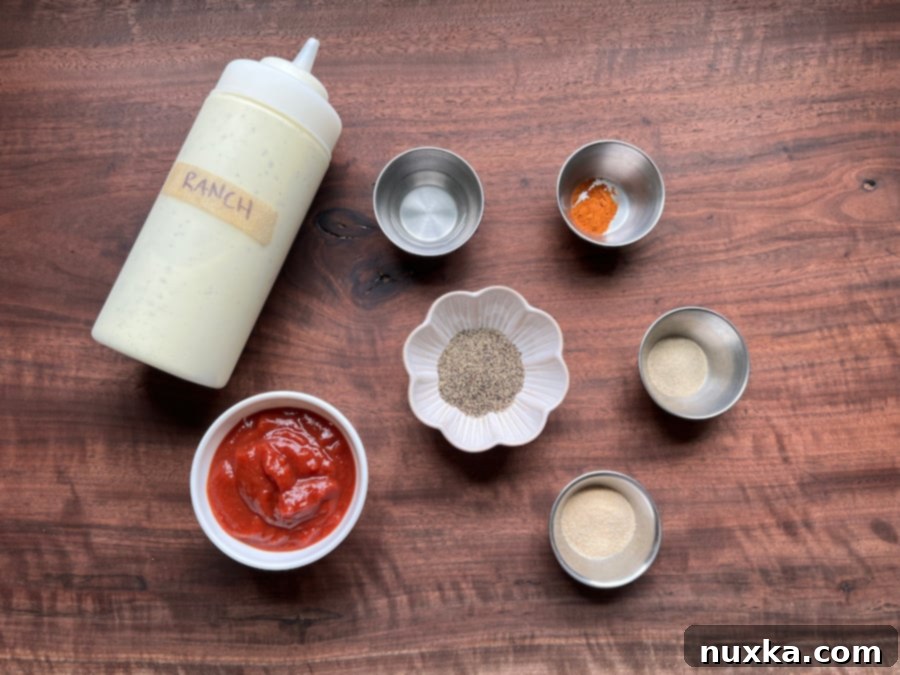 ingredients for Zax sauce recipe, including ranch, ketchup, and various spices