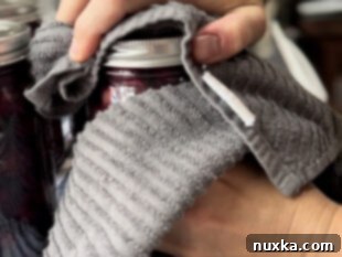 shutting jars tight for a proper seal after water bath canning