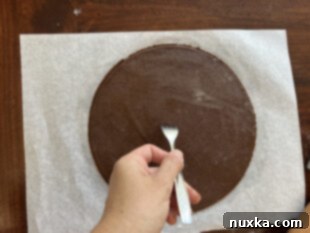 pricking cake layers with a fork