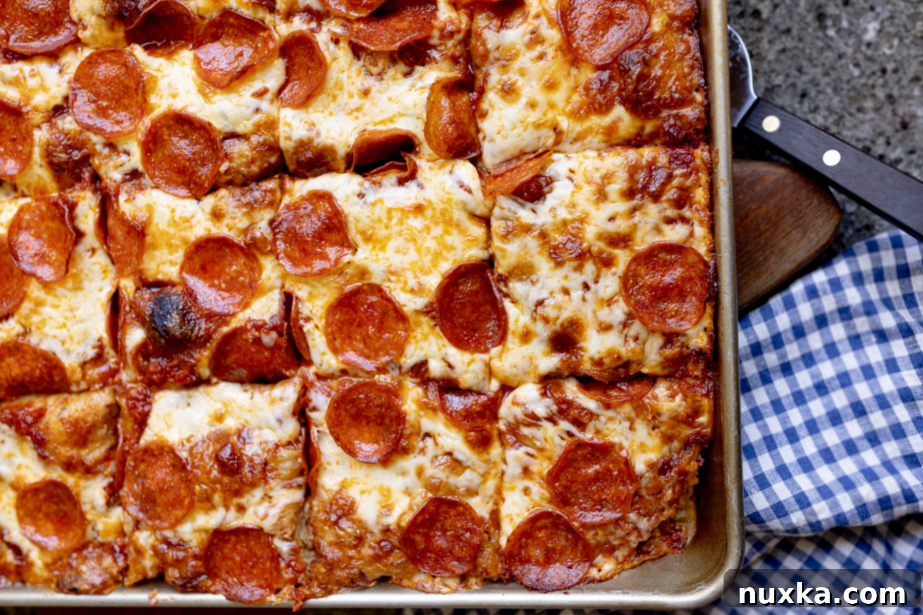 thick rectangular sourdough pizza known as focaccia pizza