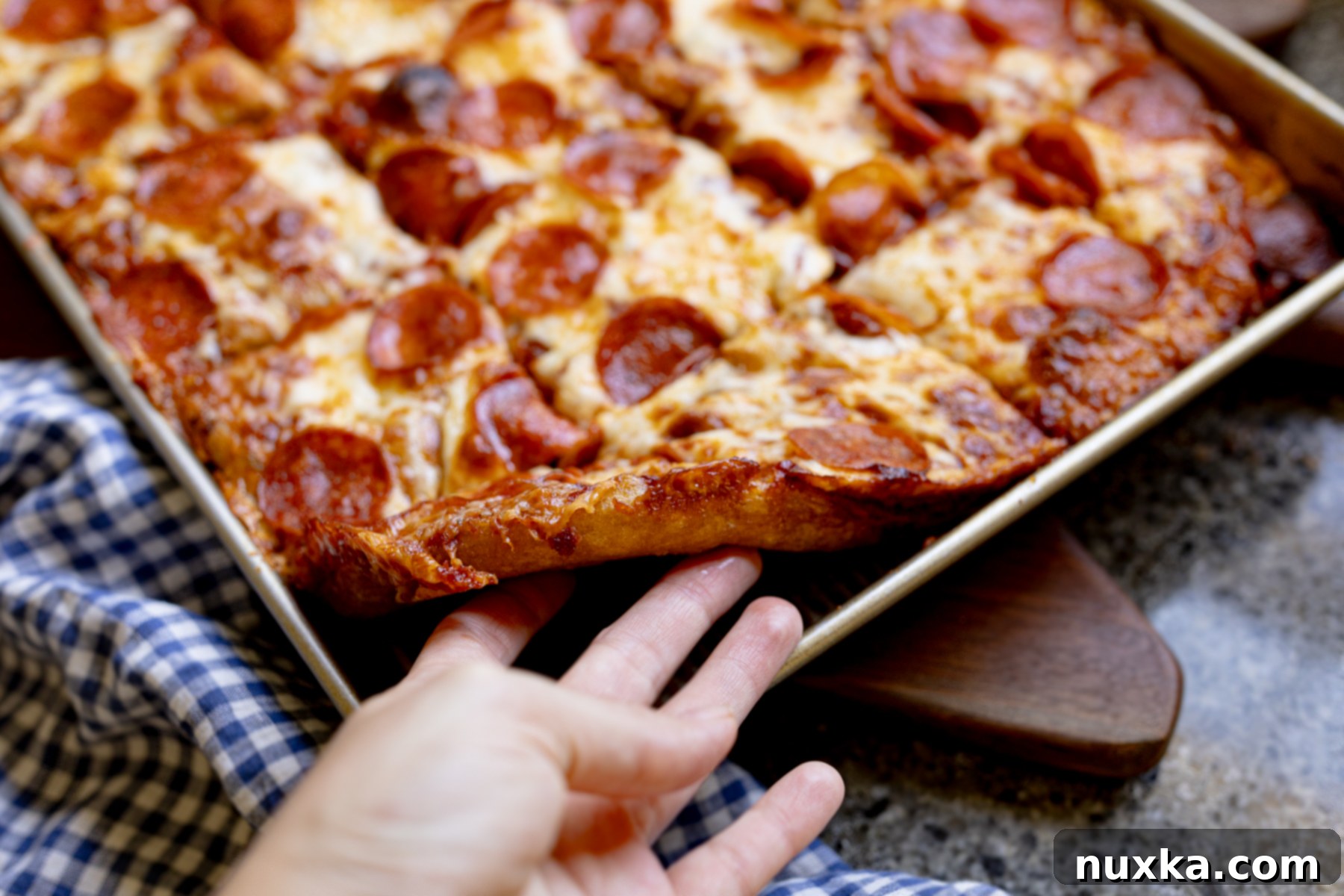 thick and crispy sourdough focaccia pizza made with freshly milled flour