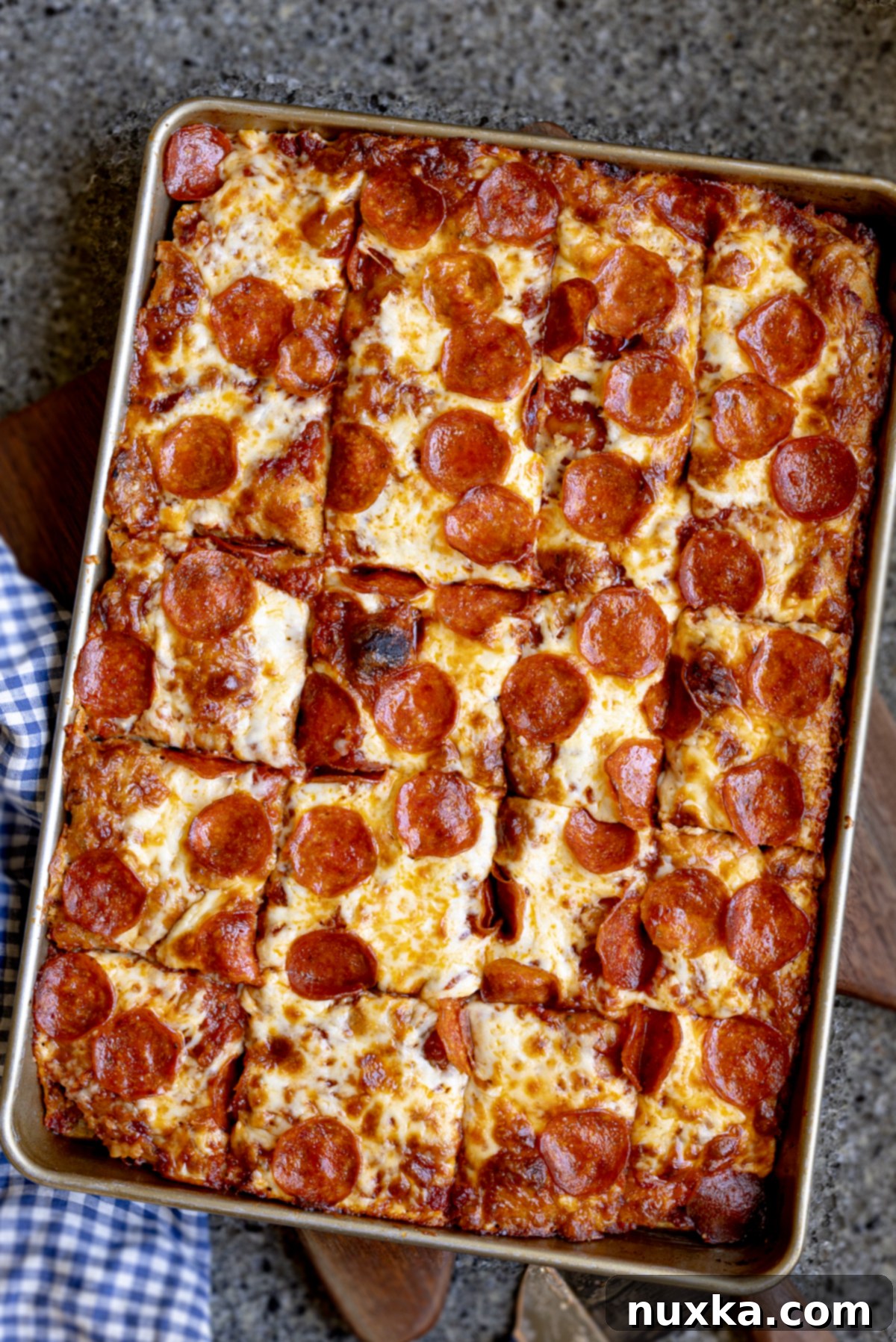 sourdough focaccia pizza cut into squares 