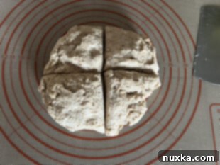 transfer dough to pastry mat and cut into 4 pieces