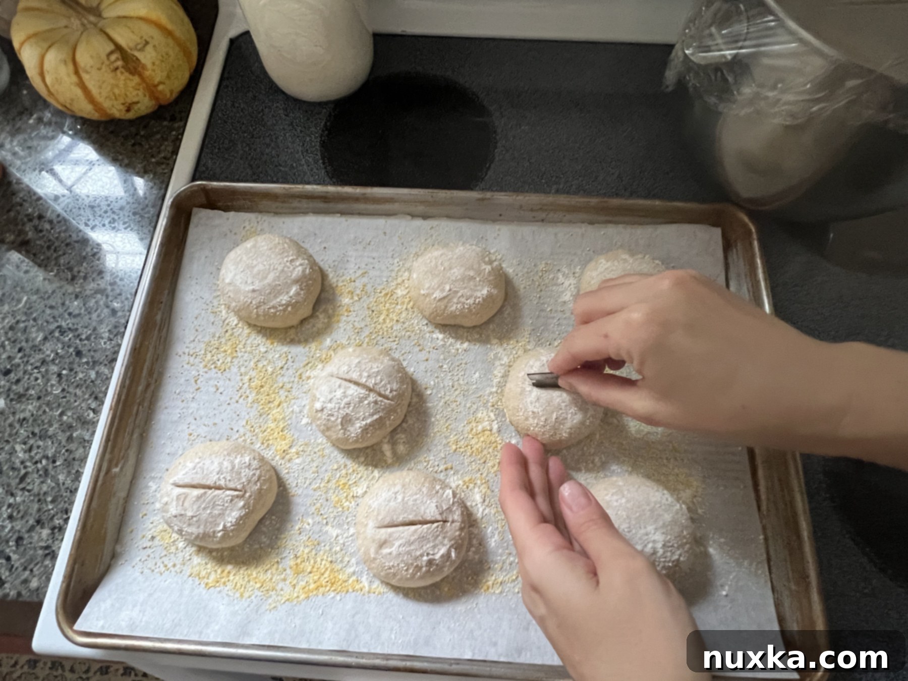 scoring sourdough rolls