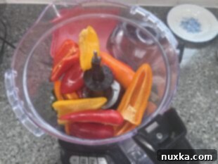 Preparing the red pepper mixture for homemade kimchi