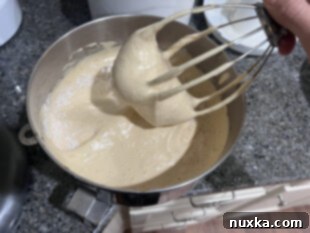 folding in the freshly milled soft wheat flour