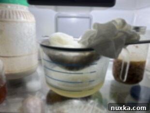 refridgerating milk kefir curds so that the whey drips down to make cream cheese