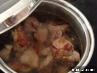 Browning meat for Plov