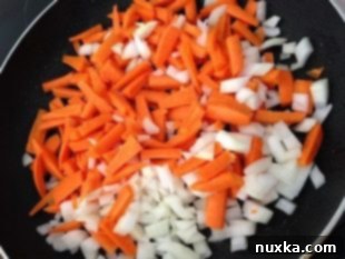 Sautéing onions and carrots for Plov