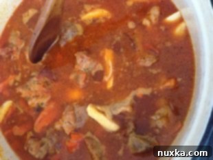 Plov simmering in a pot
