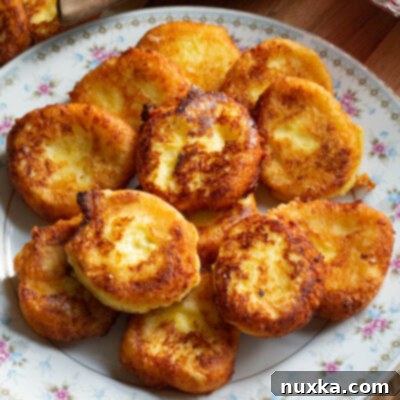 Syrniki Russian Cheese Pancakes Recipe 3 Russian Syrniki recipe with farmers cheese (cottage cheese), eggs, flour, sugar, and salt.