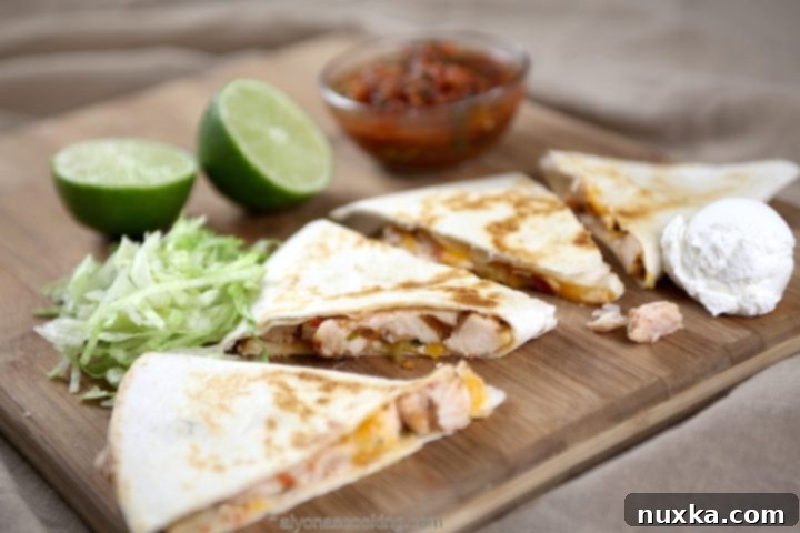 Delicious golden brown chicken quesadillas sliced and ready to serve
