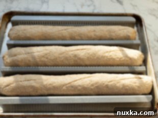scoring the baguette dough