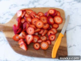 sliced strawberries for spinach and strawberry salad
