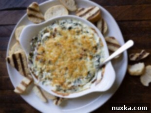 serving homemade Longhorn parmesan crusted spinach dip