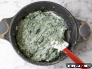 melting cream cheese in spinach for Longhorn spinach dip