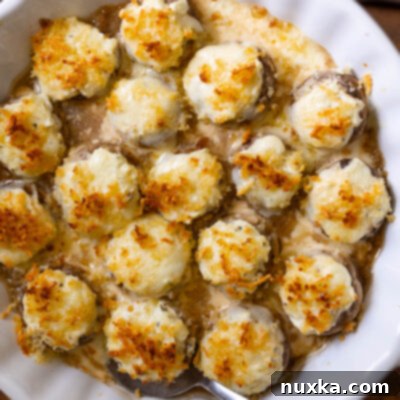 Longhorn's Famous Stuffed Mushrooms Recipe 4 Longhorn stuffed mushrooms (with creamy white cheddar filling, parmesan rust, and four cheese sauce)