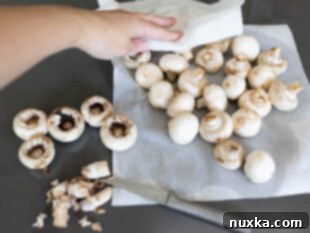 cleaning whole white mushrooms for Longhorn stuffed mushrooms