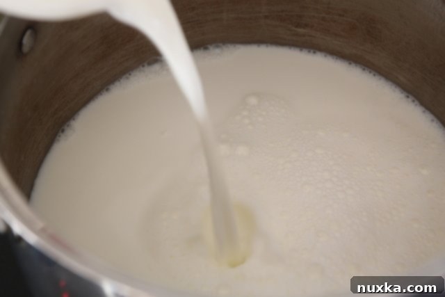 Step 1: Water boiling in a large pot, ready for milk to be added for Molochne.