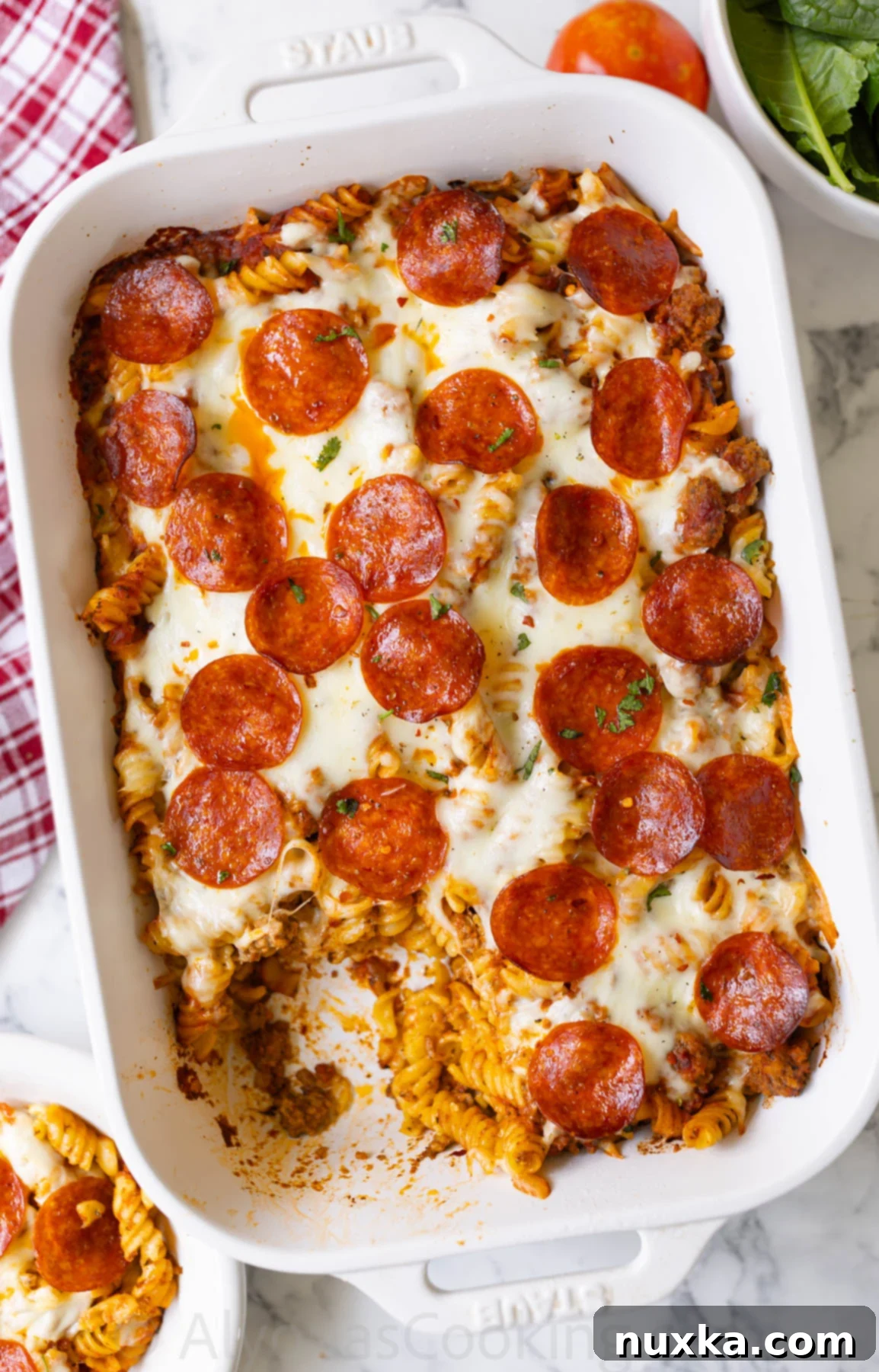 pizza casserole that is a pasta-style baked casserole