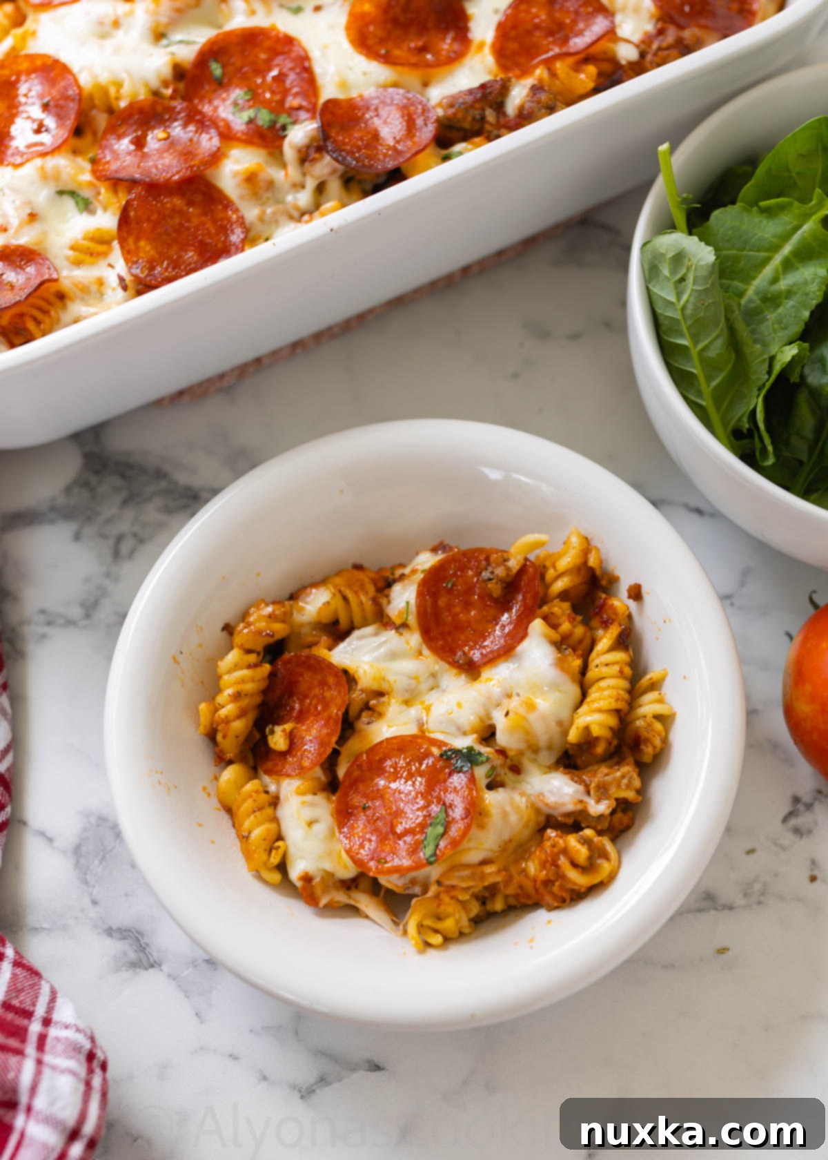 easy pizza casserole on a plate 