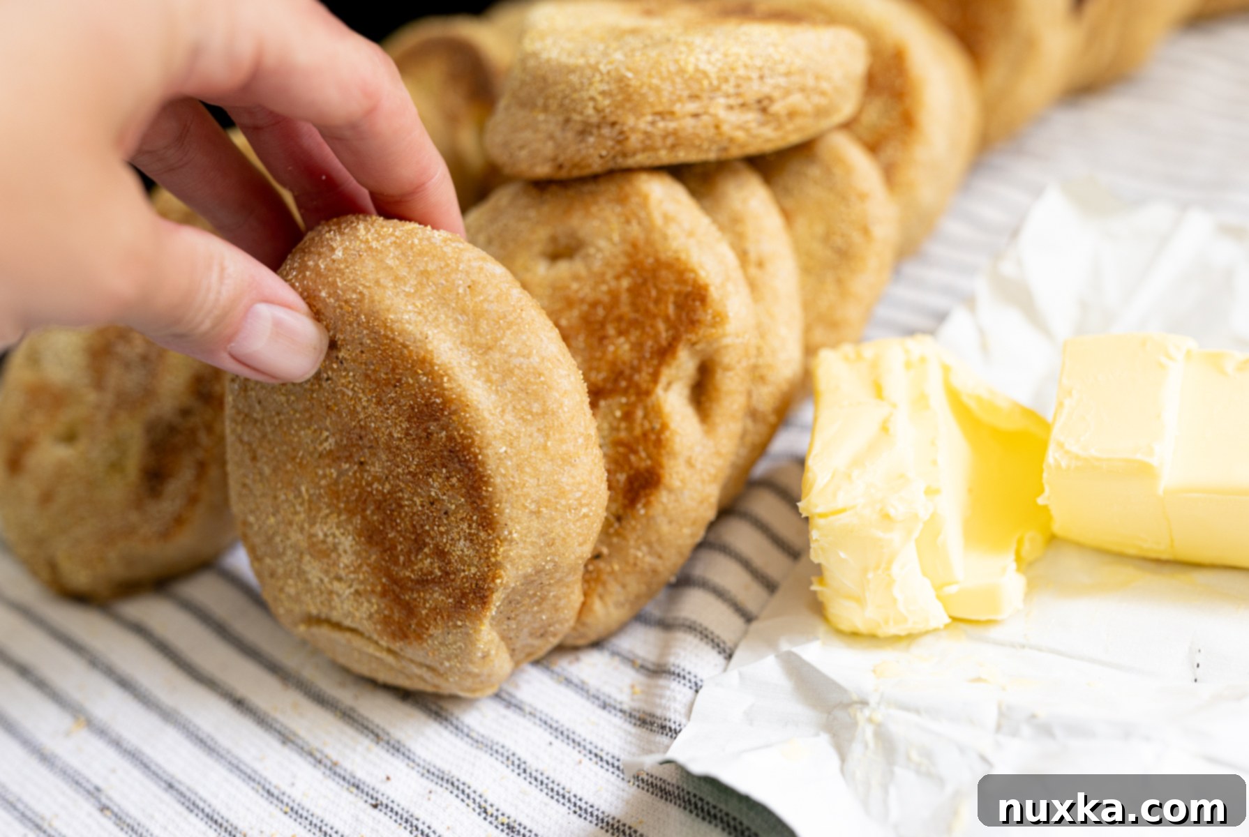 Close-up of soft and chewy Whole Wheat English muffins, perfectly browned and ready to be enjoyed