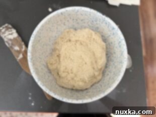 Close-up of fluffy homemade refrigerator biscuit dough for Woof Em Sticks