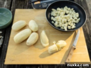 image of russet potatoes being prepared for breakfast (washed and cubed)