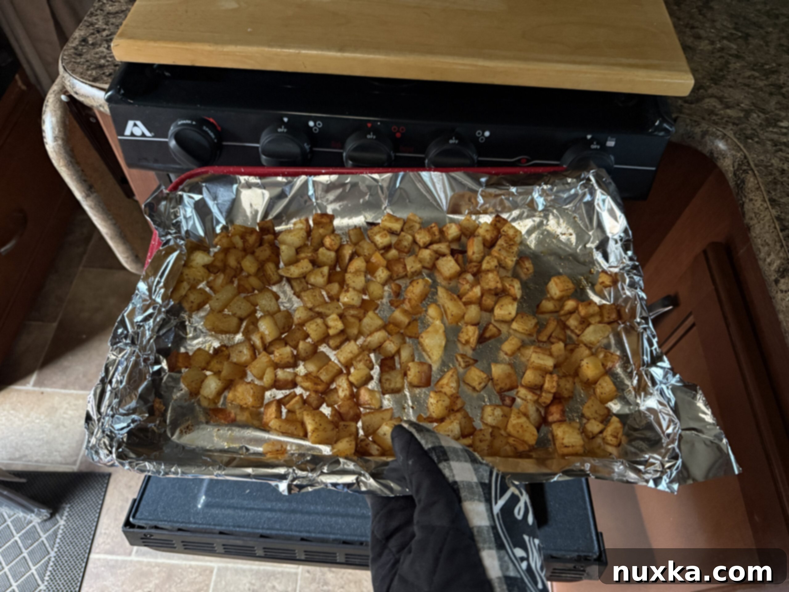 image of breakfast potatoes in an RV oven for camping
