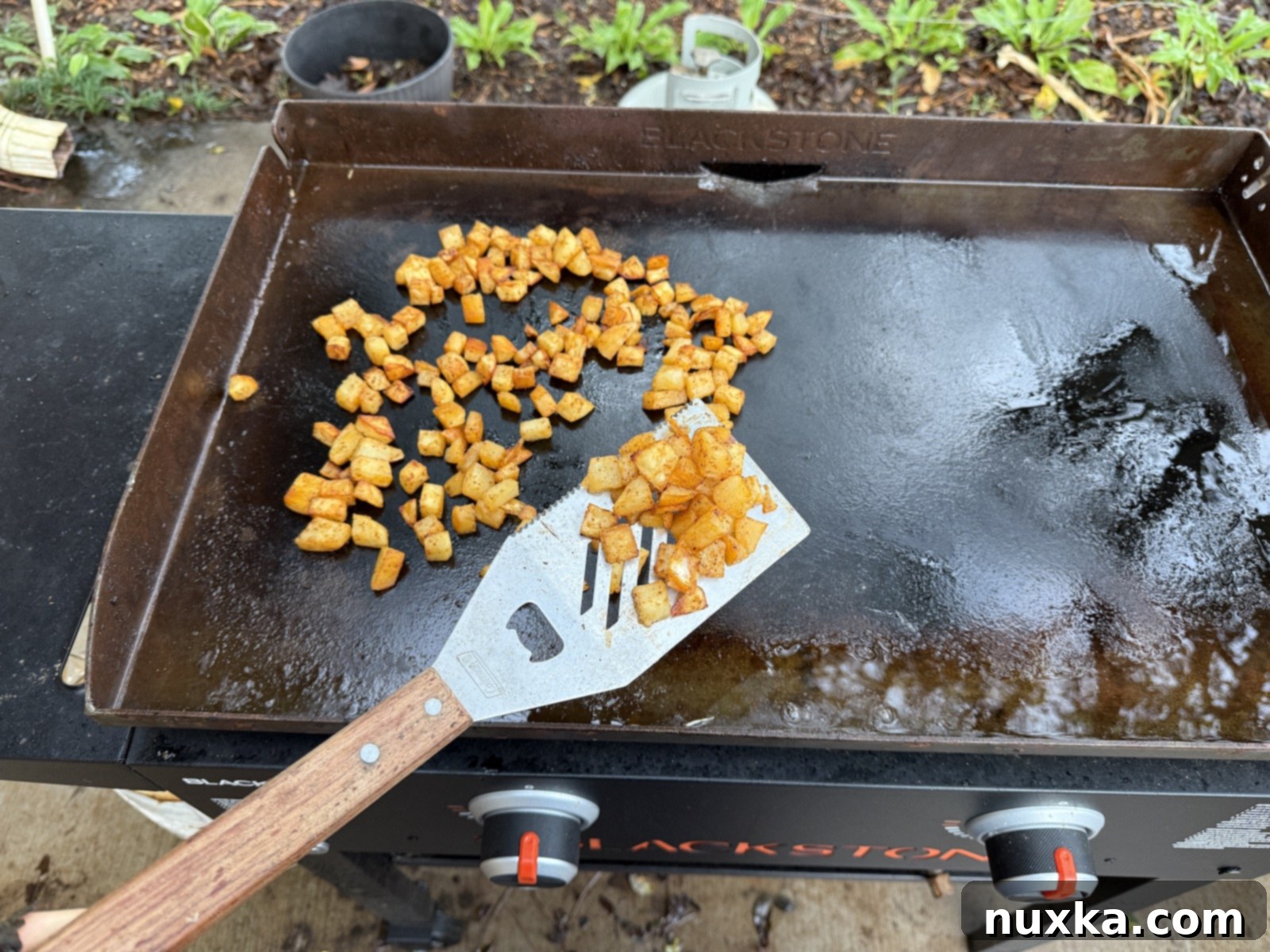 image of cooked breakfast potatoes on a Blackstone