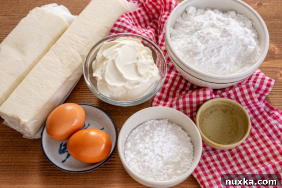Ingredients for Easy Cheese Danish: puff pastry sheets, cream cheese, powdered sugar, eggs, and water for glaze