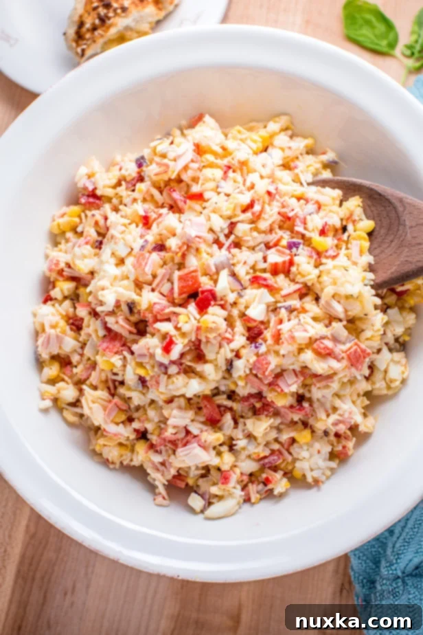 creamy crab and rice salad with fresh ingredients