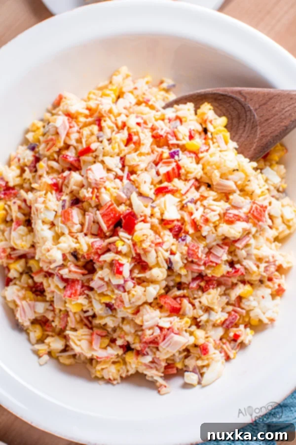 close up of creamy crab and rice salad