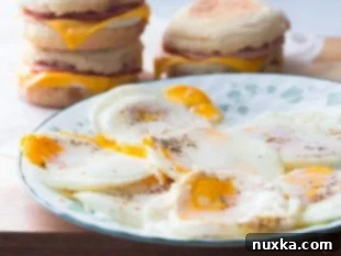 Baked egg patties ready to be used in various breakfast sandwiches like bagels, croissants, or English muffins