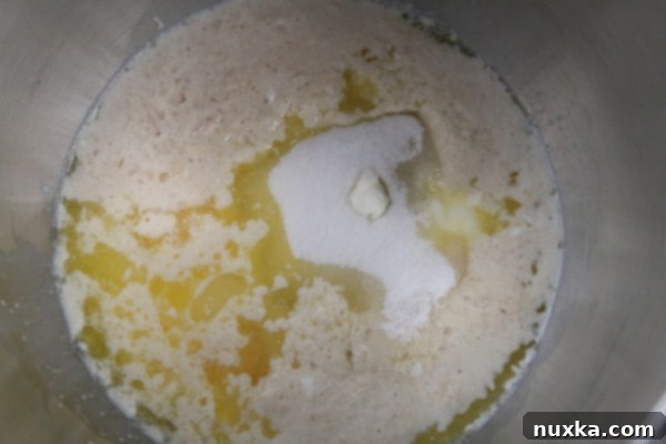 Mixing wet ingredients for Kulich dough